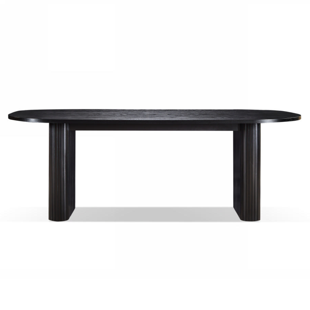Black oval dining table on a white background