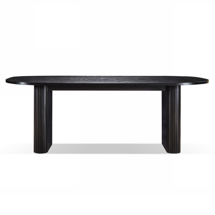 Black oval dining table on a white background