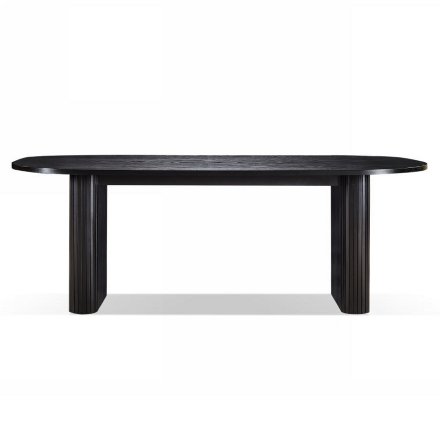Black oval dining table on a white background