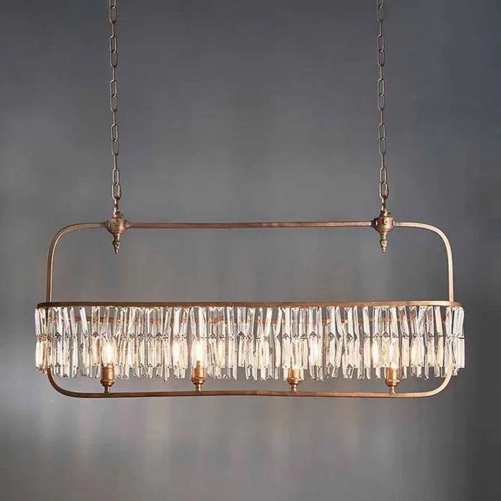Montreal Long Chandelier 4x40w E14 in Antique Brass